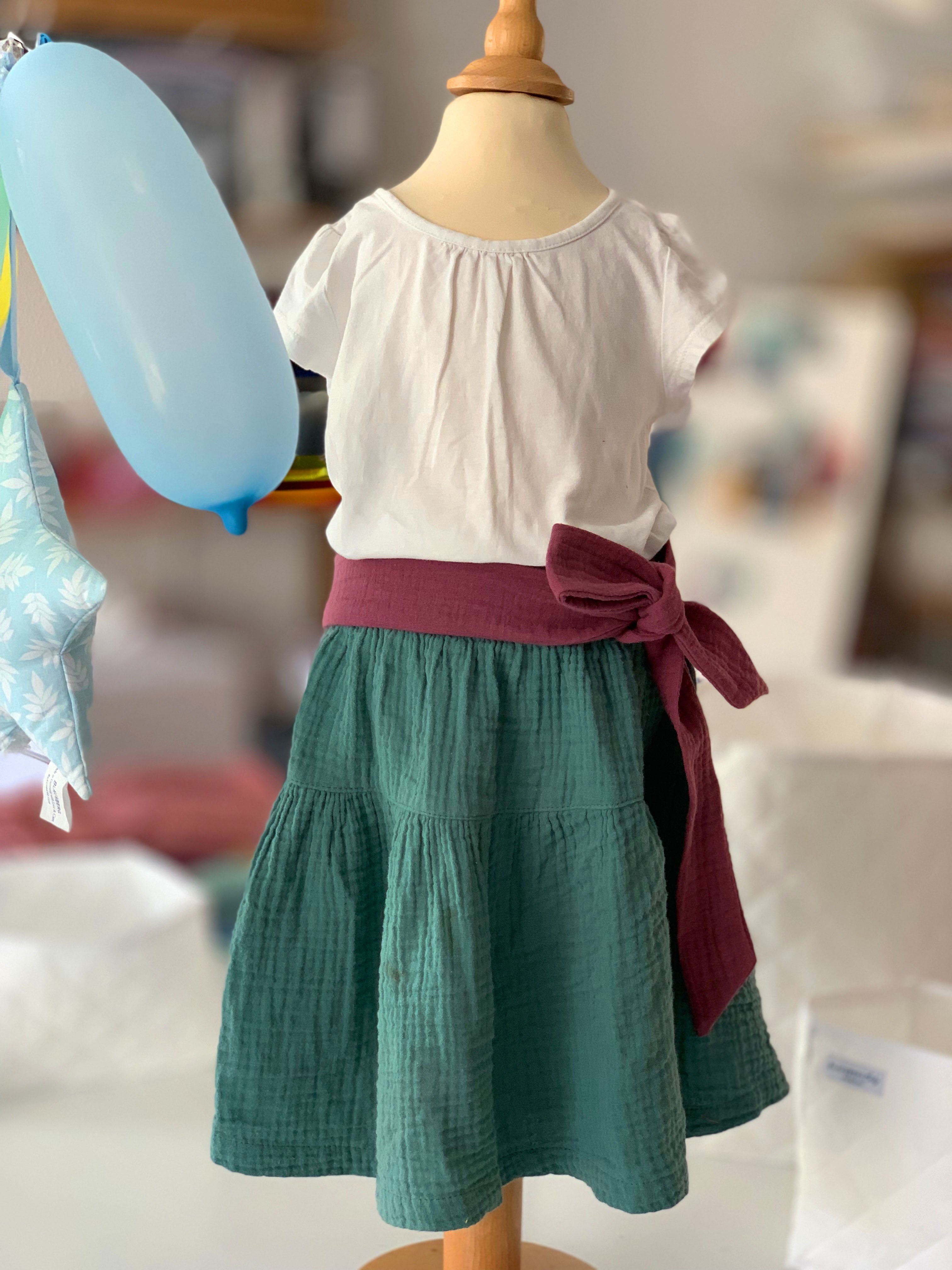Musselin Rock Mädchen Grün mit dazu wählbarer Schleife in verschiedenen Farben Blausberg Baby